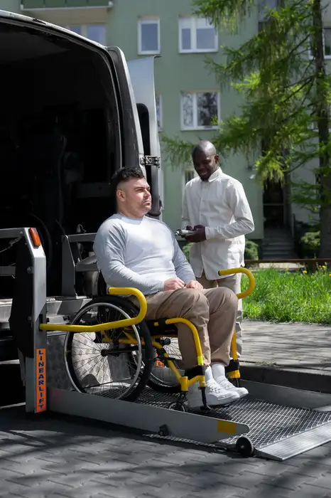 Friendly support worker greeting an NDIS participant at a vehicle in Armadale, ready for a safe and comfortable transport journey